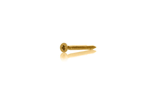 istock macro screw of golden color on a white background 1713510077