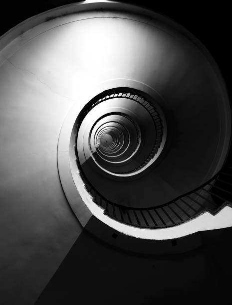 istock Spiral staircase iwith the steps going towards infinity 1713511471