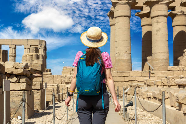 istock Woman at Luxor Temple in Egypt 1713512291