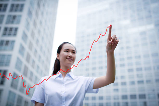 Business Woman Drawing a Growth Chart - XXXLarge stock photo