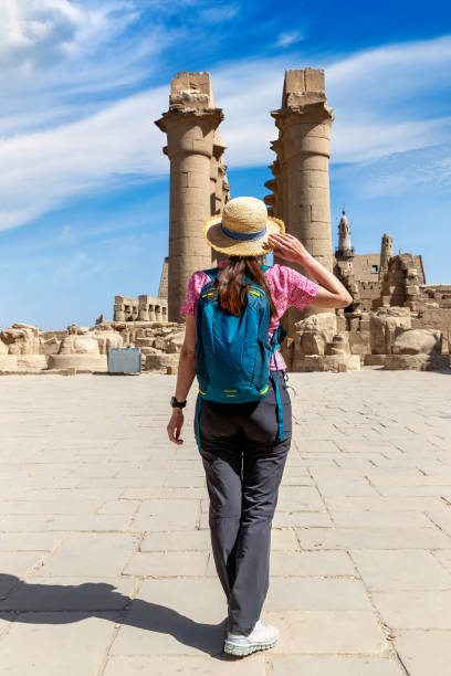 istock Woman at Luxor Temple in Egypt 1713516807
