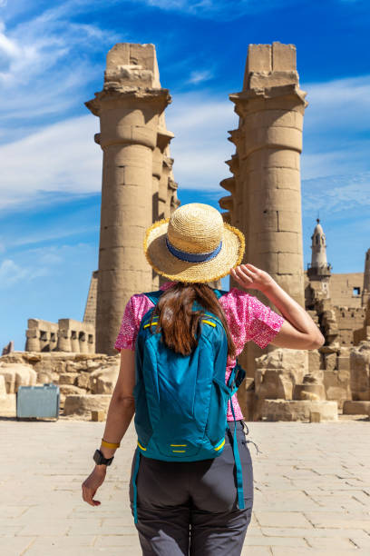 istock Woman at Luxor Temple in Egypt 1713517876