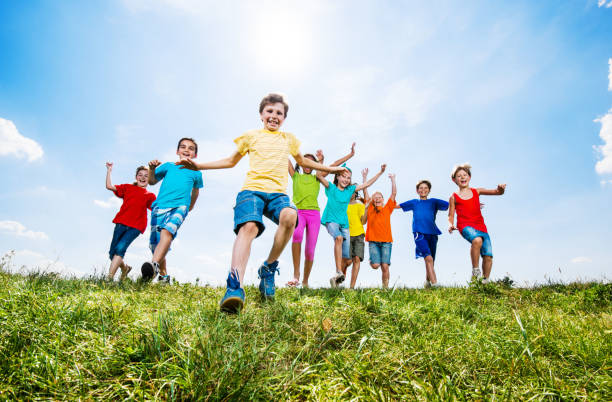 istock Cheerful kids running in the field. 171351796