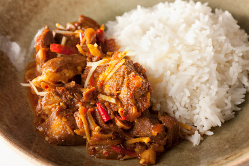 Delicious rich meaty 'Gang Hang Lay', traditional Shan Burmese pork curry made with ginger and peanuts. Here it is served with fresh steamed Jasmine rice. This curry dish is famous in Myanmar but also is known as a typical dish of Northern Thailand, where it is very popular.