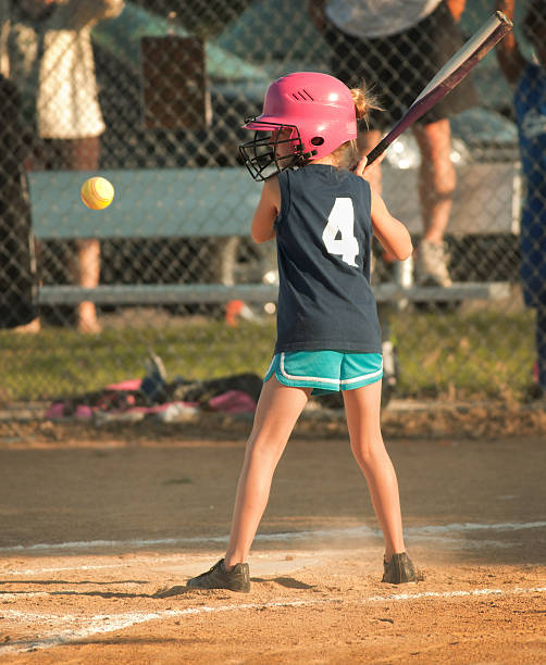 istock Young Girl Child Softball Player Batting in Competitive Game 171352393