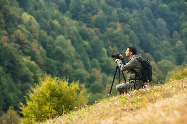 istock Landscape photographer in action 171352838