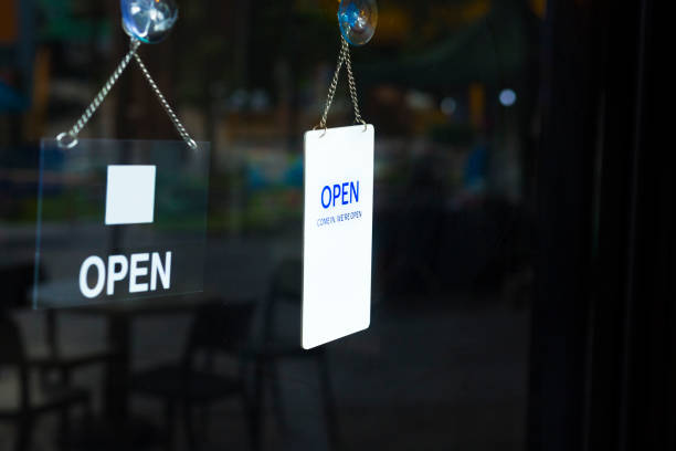 istock Open signs at window and door 1713531355