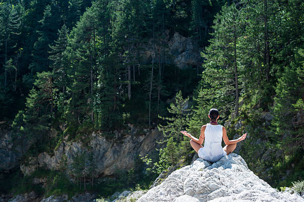 istock Yoga on the rocks in mountain 171353641