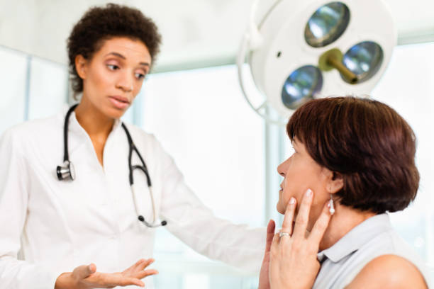istock Female doctor talking with patient 171353666
