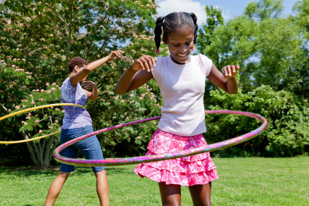 istock Mother and Daughter Hula Hooping 171353822