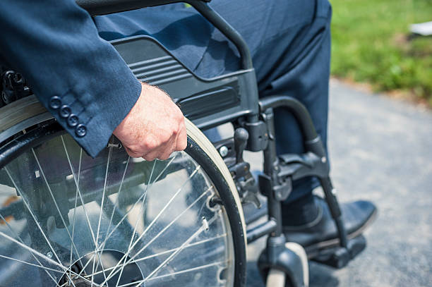 istock Man sitting on a wheelchair in Berlin 171354198
