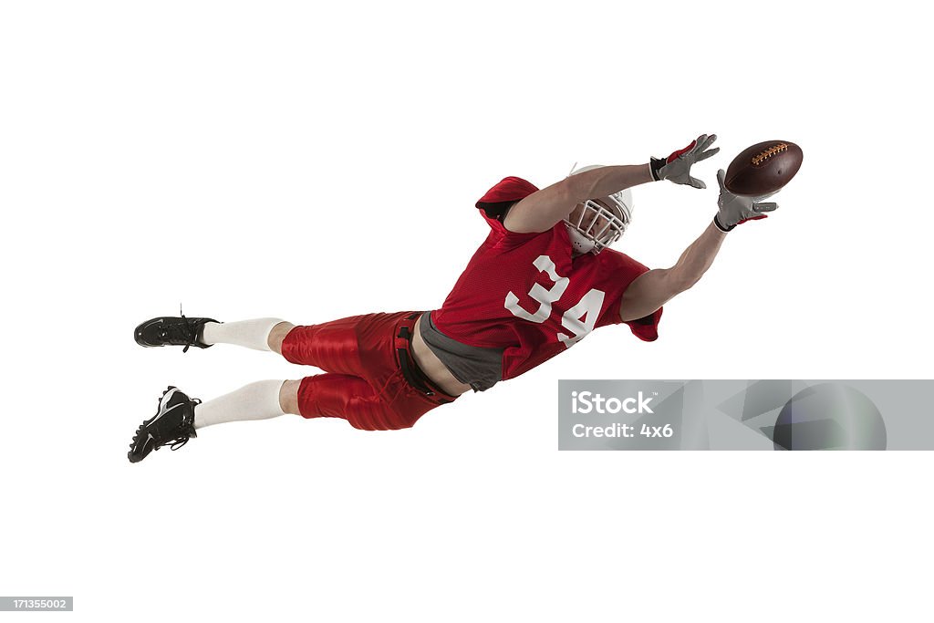 American-football-Spieler in Aktion - Lizenzfrei Amerikanischer Football Stock-Foto