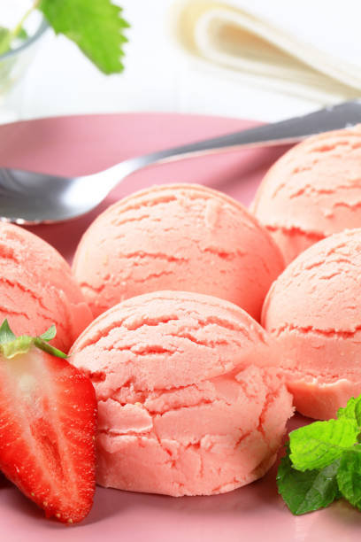 istock Scoops of strawberry icecream on a pink plate 171355247