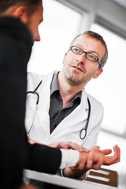 istock Businessman at the doctor's. 171355375