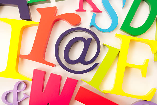 istock AT @ symbol amongst colourful type 171355640
