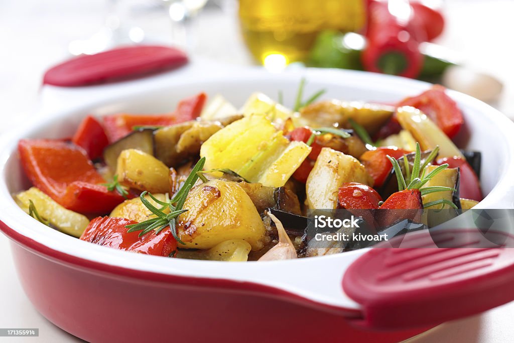 Roasting Vegetables A medley of vegetables roasting on the grill. Roasted Stock Photo