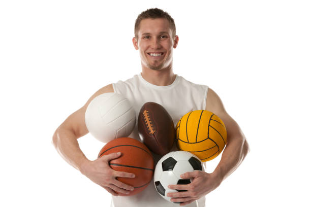 istock Sports man holding assorted balls 171356016