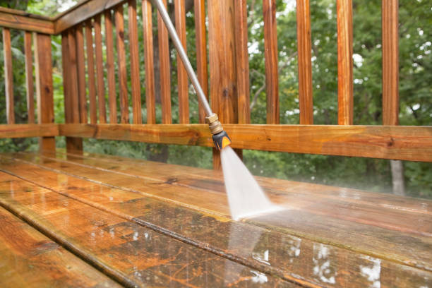 Pressure Washer Cleaning a Weathered Deck A pressure washer sprayer is cleaning a weathered treated wood deck. decking stock pictures, royalty-free photos & images