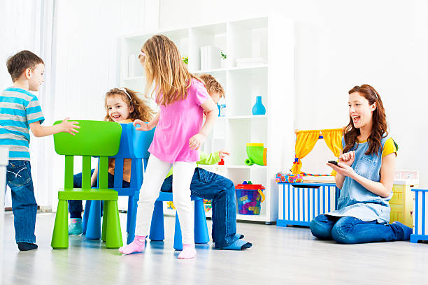 istock Children Playing Musical Chairs Indoors. 171356587