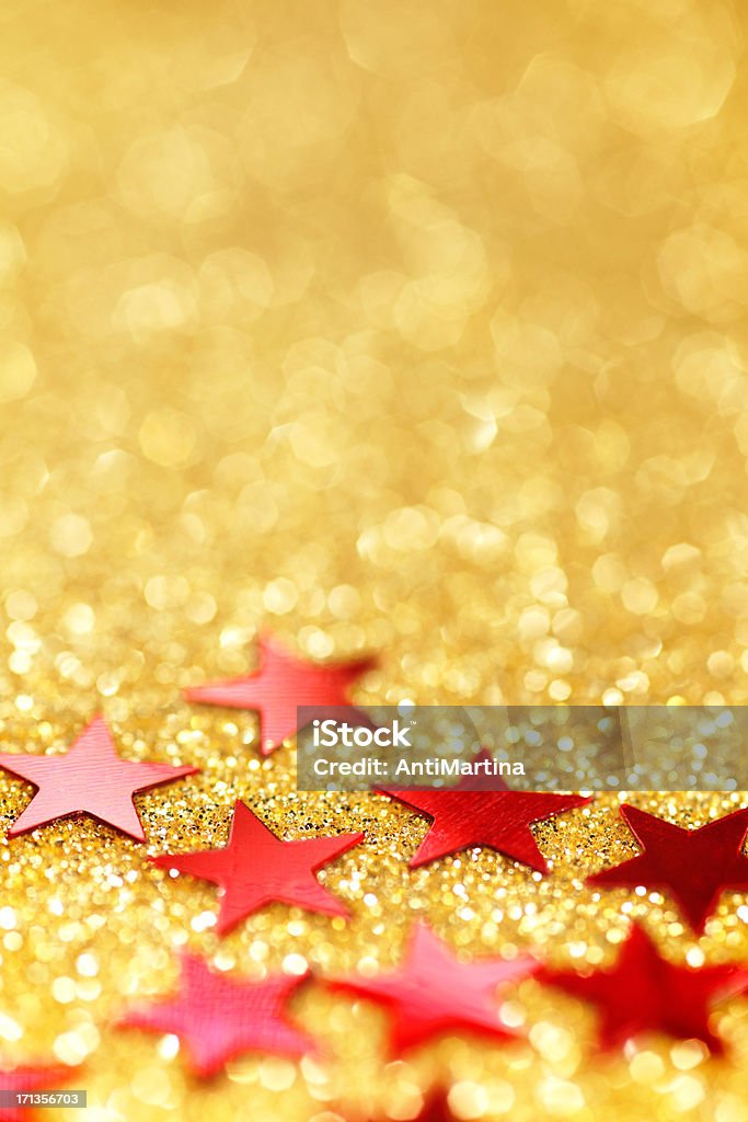 red stars on golden glittering background Backgrounds Stock Photo