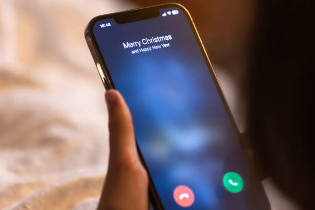 istock Incoming call screen from Merry Christmas, close up. 1713571350