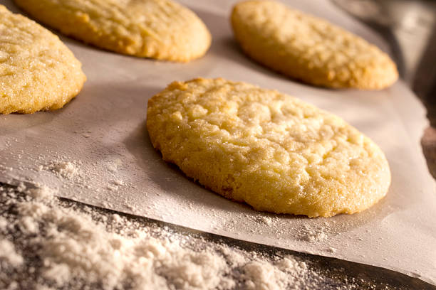 Baked in the Morning Sugar cookies cooling off on the countertop in the morning light Sugar Cookie stock pictures, royalty-free photos & images