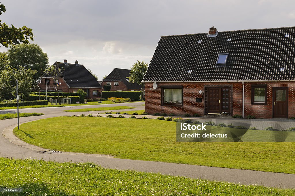 Idyllic Village little houses on the roadside in the small village. Cottage Stock Photo