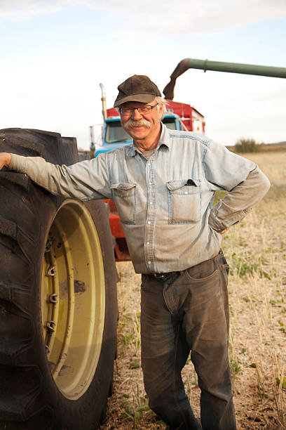 istock Farmer in Field at Harvest 171357656