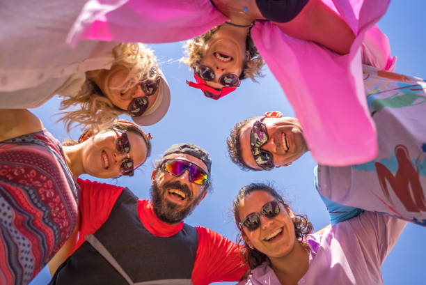 istock Friends huddled together 1713580013