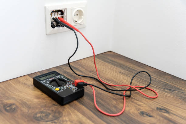 istock a pair of wire probes are plugged into the socket. Multimeter for measuring voltage. 1713581544