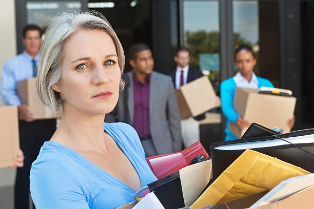 istock Mature woman leaving office after being fired or laid off 171358566