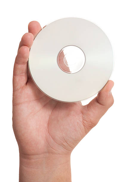istock Man hand holding a blank disc isolated on white 171359037