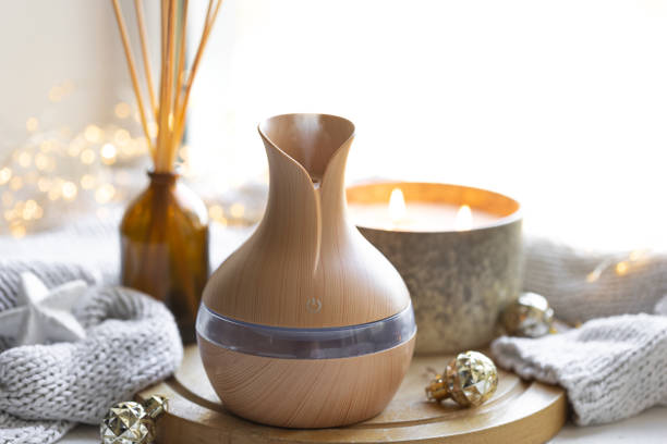 istock Still life with an aroma diffuser for moisturizing the air and winter decor. 1713592592