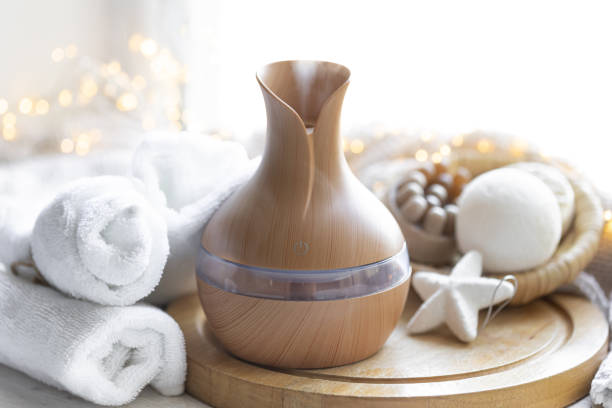 istock Still life with an aroma diffuser for moisturizing the air and winter decor. 1713592596