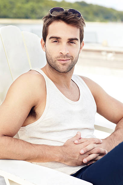 istock Handsome man sitting outdoor in a beach chair 171359508