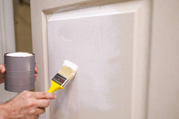 istock Repair staining the doors with paint 1713599345