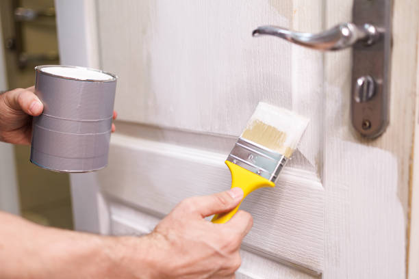 istock Repair staining the doors with paint 1713599361