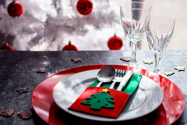 istock Nice Christmas table setting on black and white background, top view 1713600630