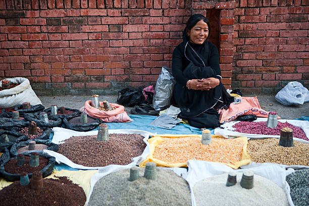 Nepali street seller - selling beans and spices.