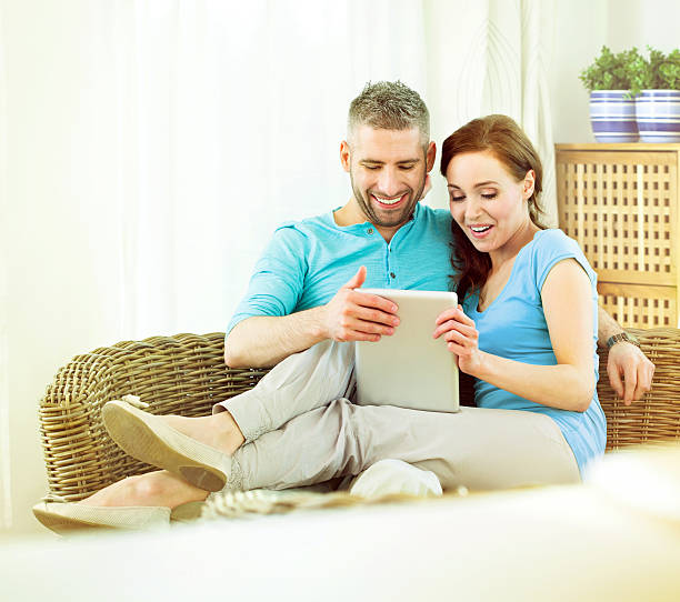 istock Happy Couple with digital tablet 171360888