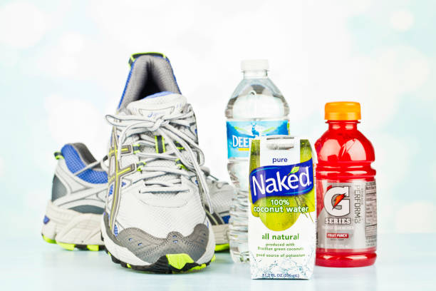 deportes y la hidratación - multi colored sports shoe horizontal editorial fotografías e imágenes de stock
