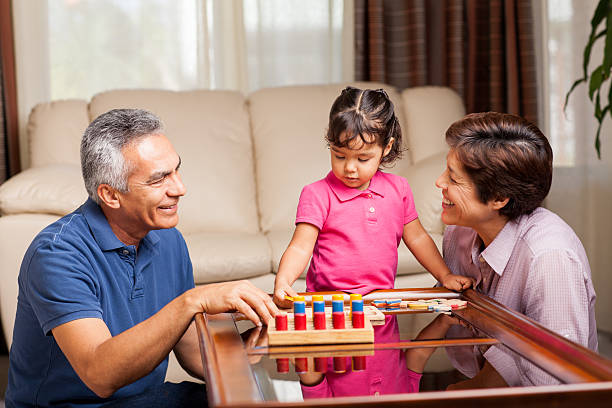 istock Grandparents playing with granddaughter 171361239