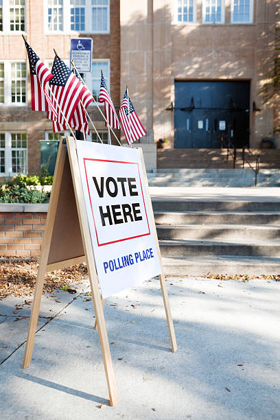 istock Vote Here Election Polling Place in USA 171361310