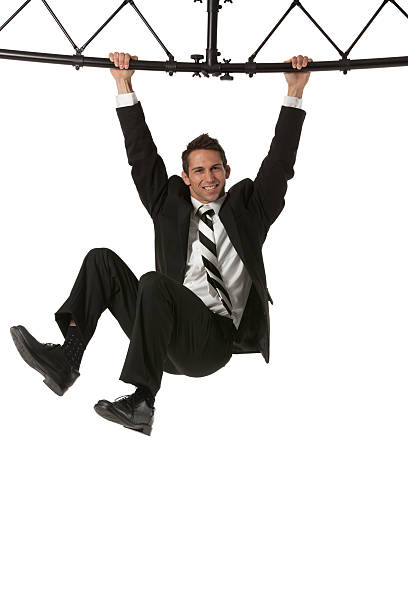 istock Businessman hanging from a metal structure 171361492