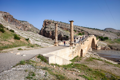 Adıyaman, Turkiye - May 13, 2012: ruins of the ancient bridge of Severan Bridge local name is cendere koprusu in Adiyaman, Turkey