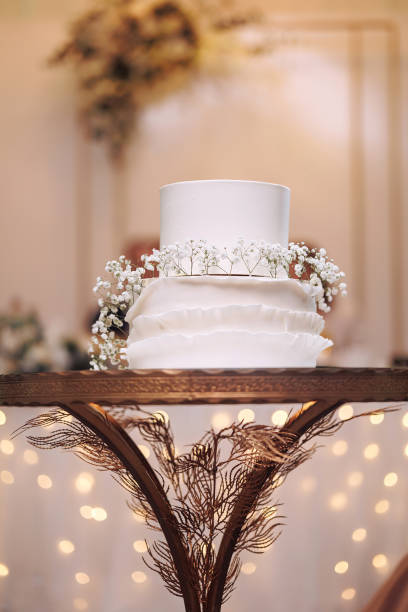 istock Wedding cake on the wooden plate 1713618639