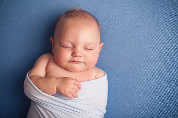 istock Sleeping Baby Boy, on Blue Background, With Copy Space 171362177