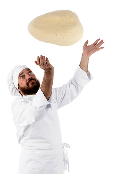 Chef tossing dough