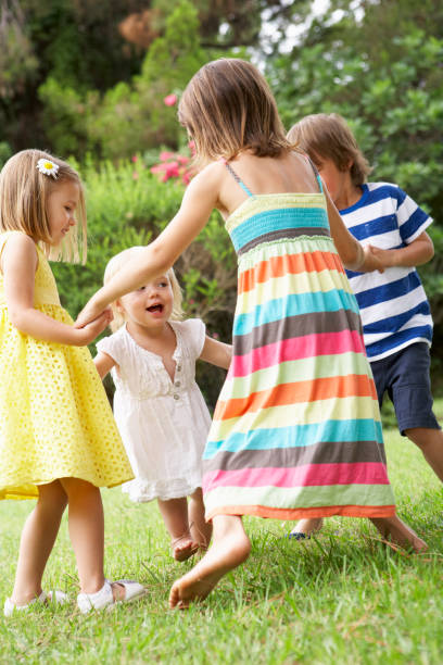 istock Group Of Children Playing Outdoors Together 171362812