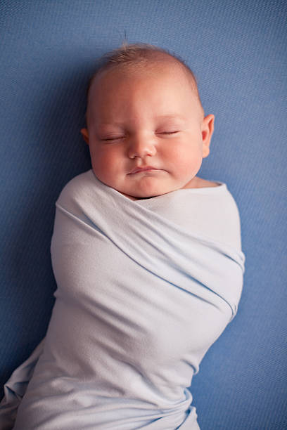 istock Color Image of Sleeping Baby Boy, on Blue Background 171362863